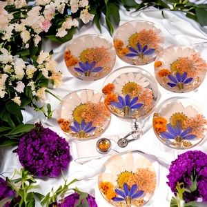 Badge reel, resin, daisy, Queen Anne's, baby's breath and shooting star.